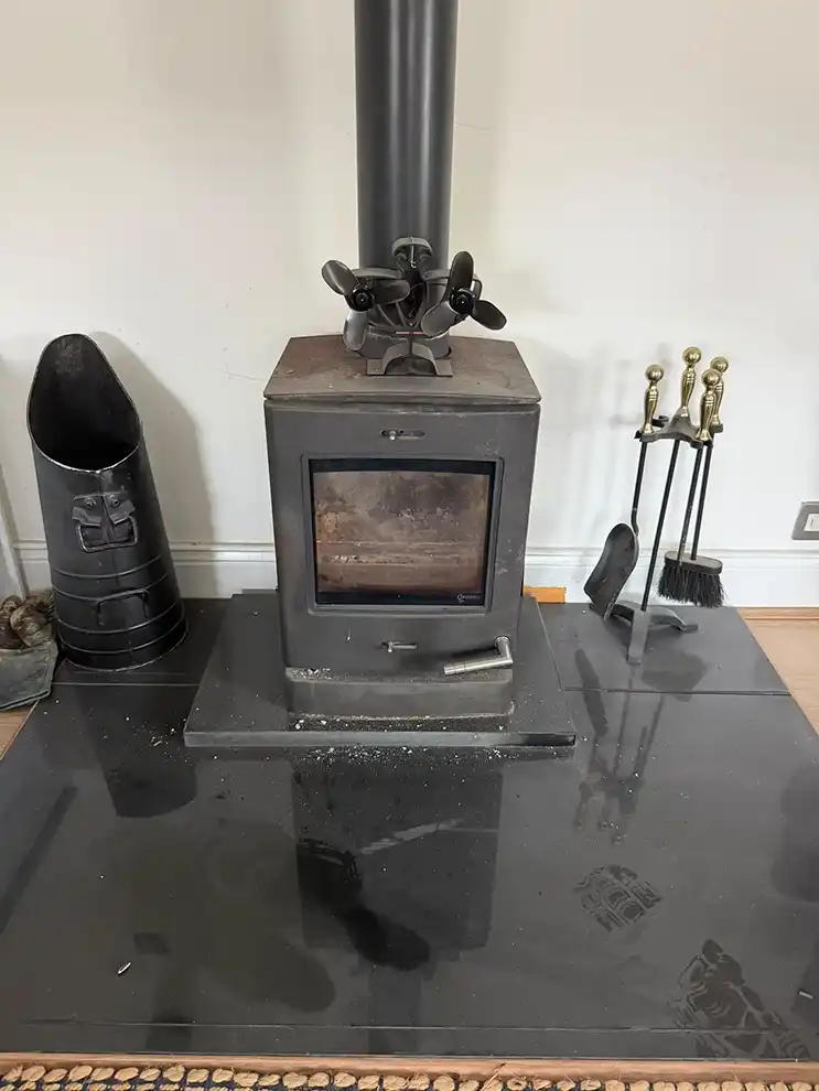 Log burner before cleaned by Hadrian Chimney Sweeps
