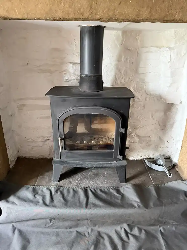Log burner before cleaned by Hadrian Chimney Sweeps