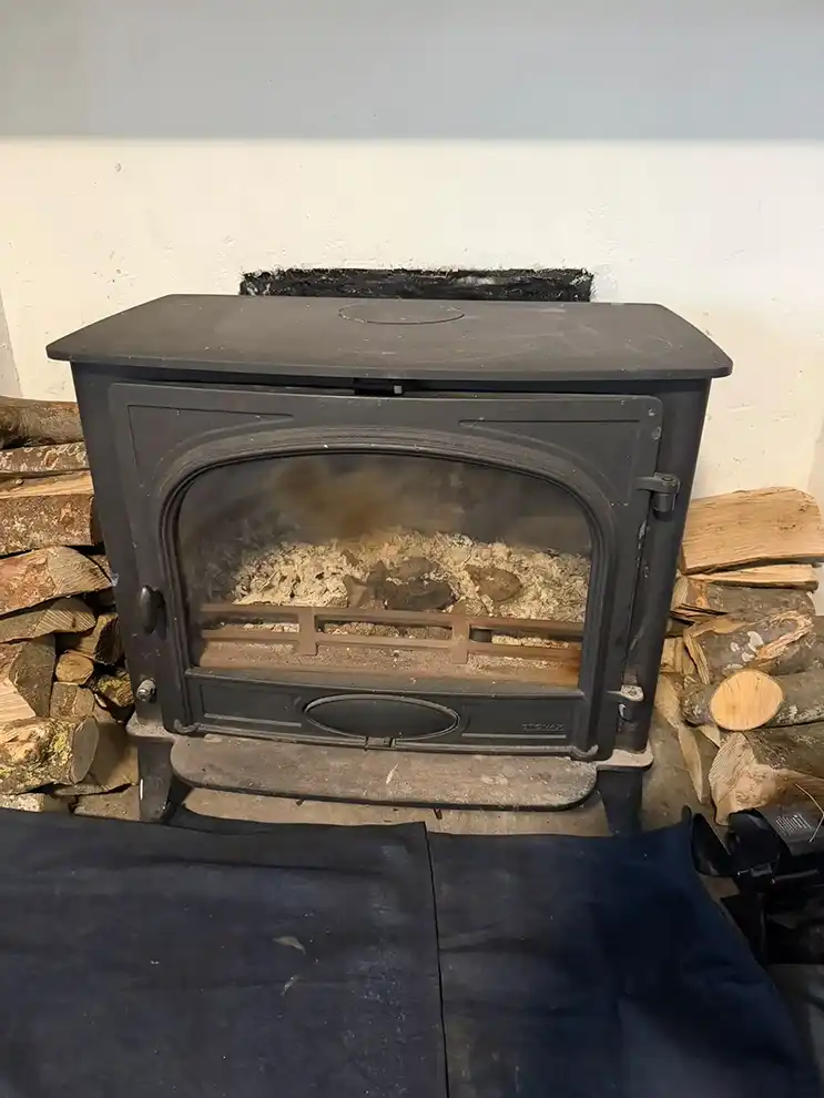 Log burner before cleaned by Hadrian Chimney Sweeps