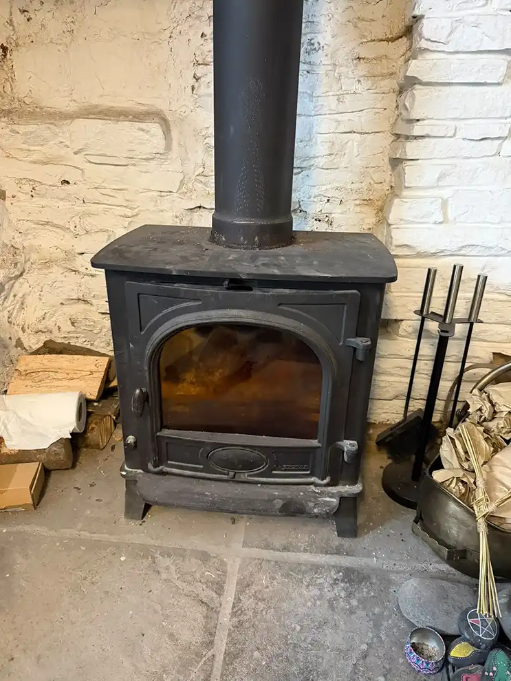 Log burner before cleaned by Hadrian Chimney Sweeps